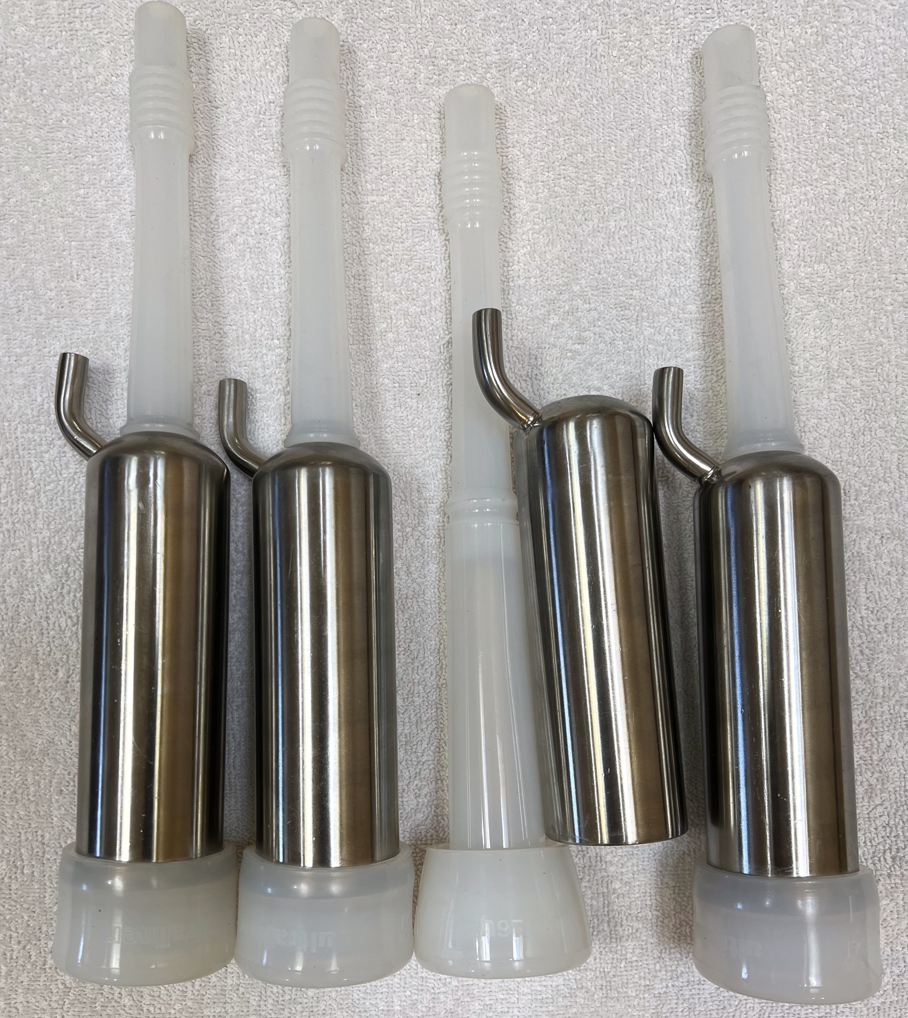 Goat Claw Cluster with automatic shut-off/open, cup-end claws, clear  plastic shell and silicone liners